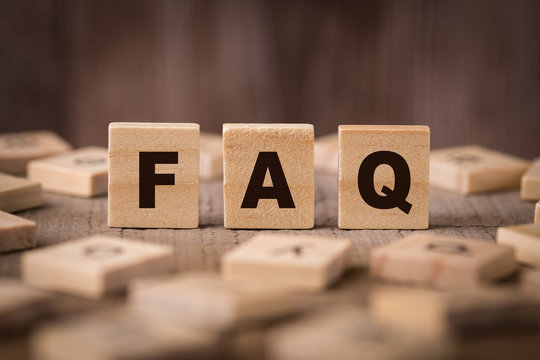 wooden cubes creating the word FAQ