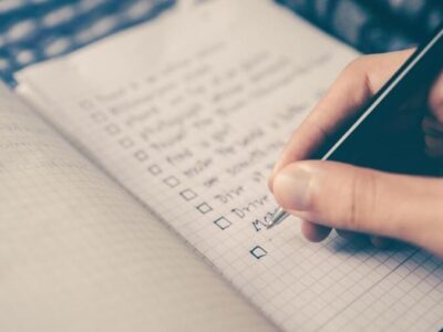aJl0MojCQ8GZ7jg3NEtd_file(1) an open notepad with a checklist.